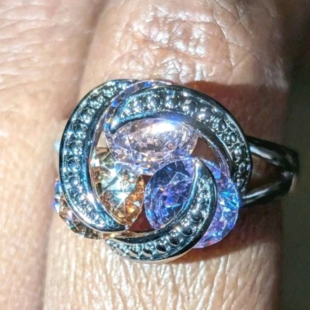 Sparkling Zirconia With Pink,yellow, and Purple Rotating Gemstone Design Sz 8